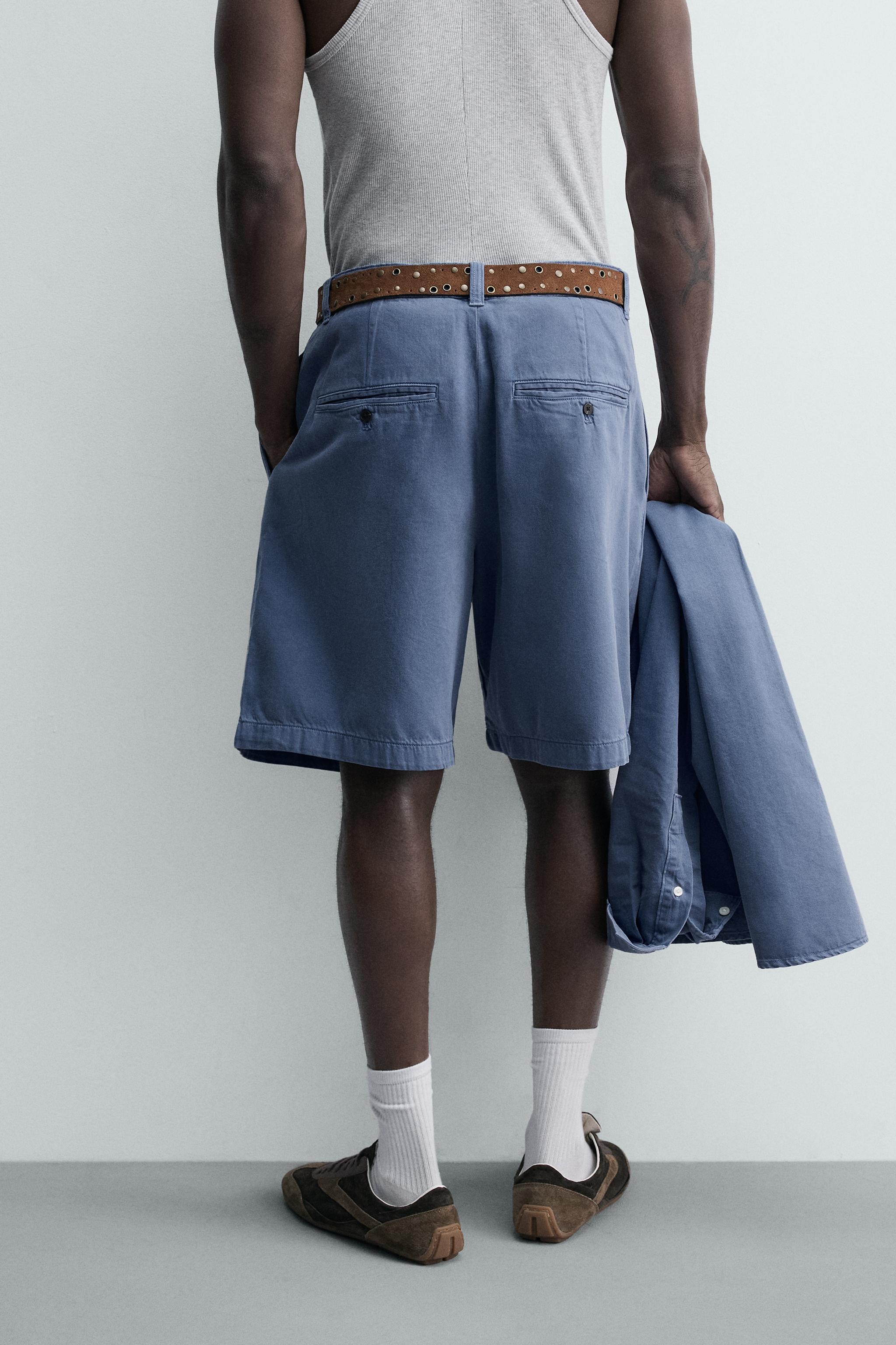 SHORT DÉLAVÉ À PLIS